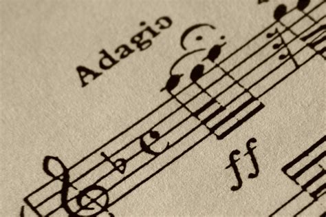 adagio music meaning: How does the adagio tempo influence the emotional depth of a piece?